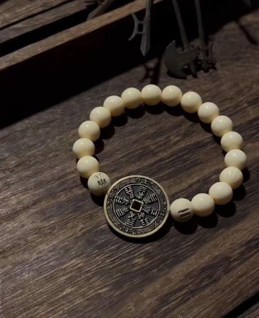 Material: mammoth ivory, brass. Archaeological mammoth ivory × Ming Dynasty alchemy furnace copper, chanted "Three Disasters Mantra" 108 times through the Maoshan Dharma Lineage - this string of evil-eating beads is actually a "office Qimen Dunjia" customized for office animals.